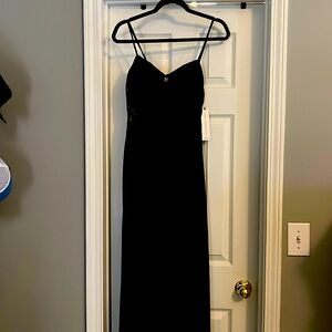 Almost Famous brand black jumpsuit with embroidery top